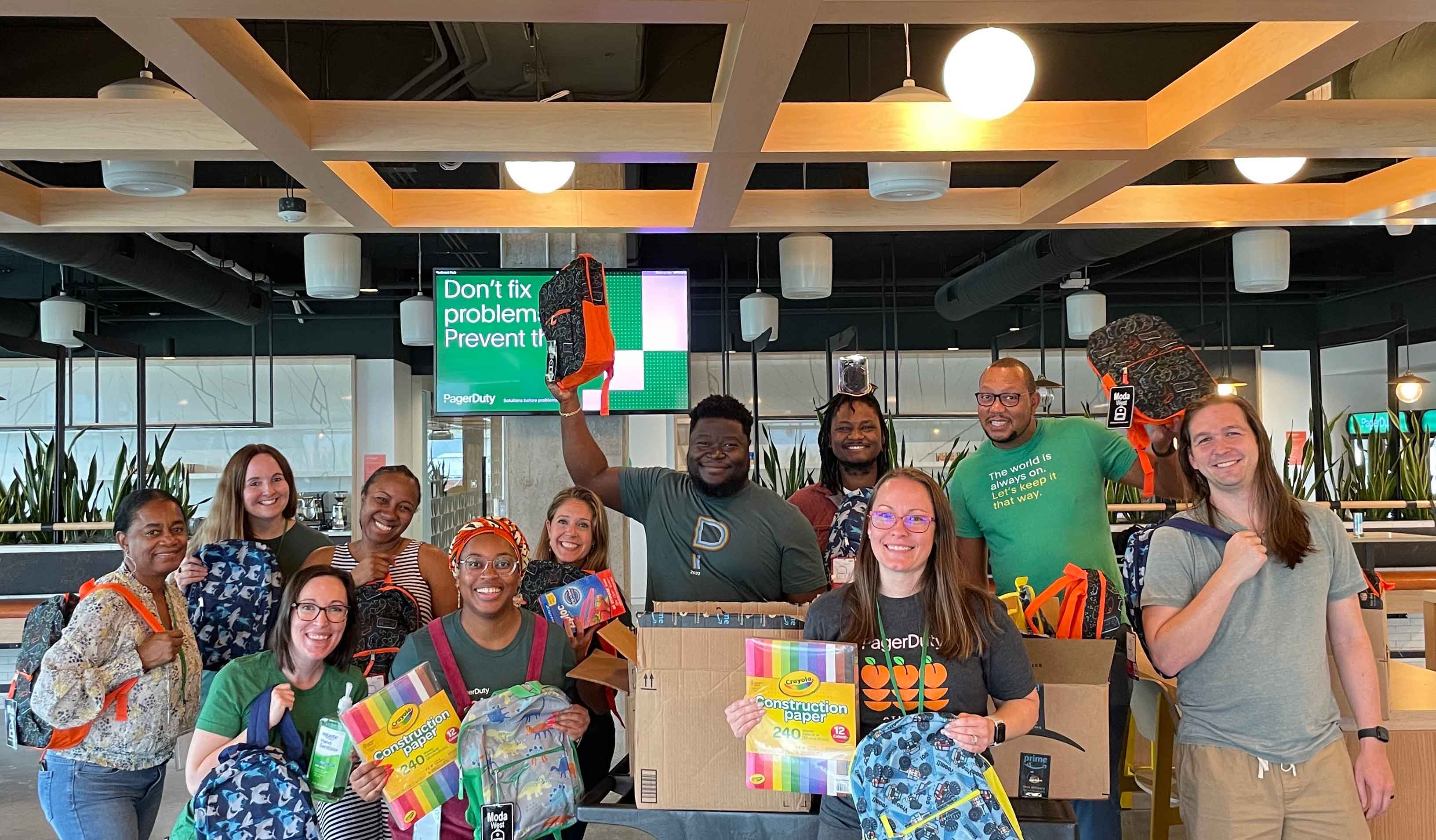 team volunteers packing backpacks